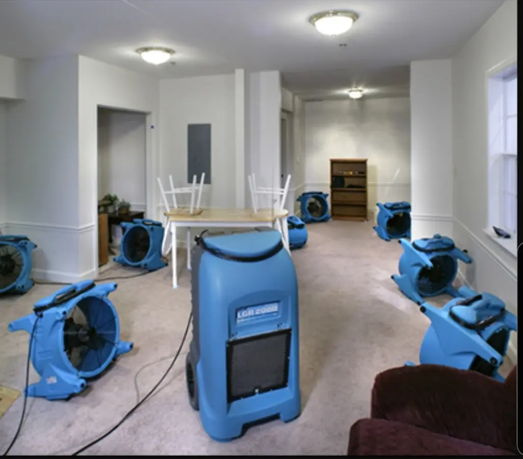 Air movers and dehumidifier setup for Water Damage Restoration in Berkley